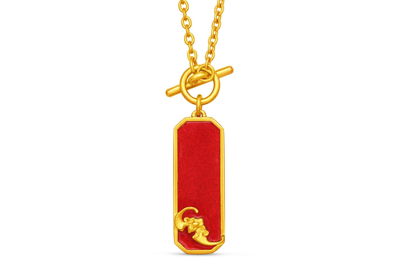 A red rectangular gold pendant showcasing the beauty of the fusion between tradition and modernity.