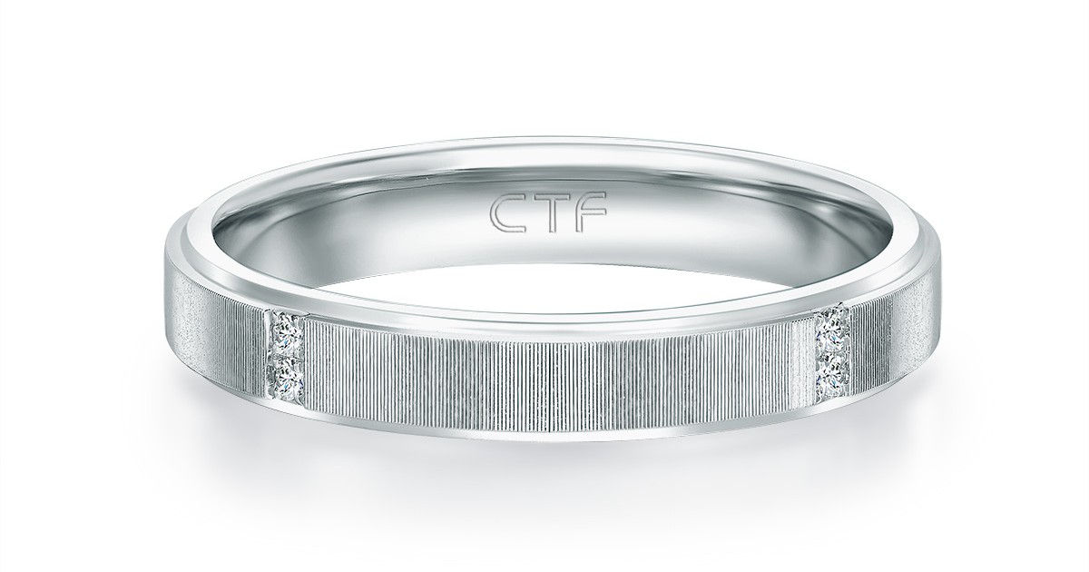 Classic 18K white gold diamond ring, understated yet elegant.