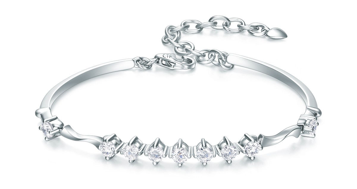 Combining rounded diamonds with a sleek bracelet design, showing utmost elegance.