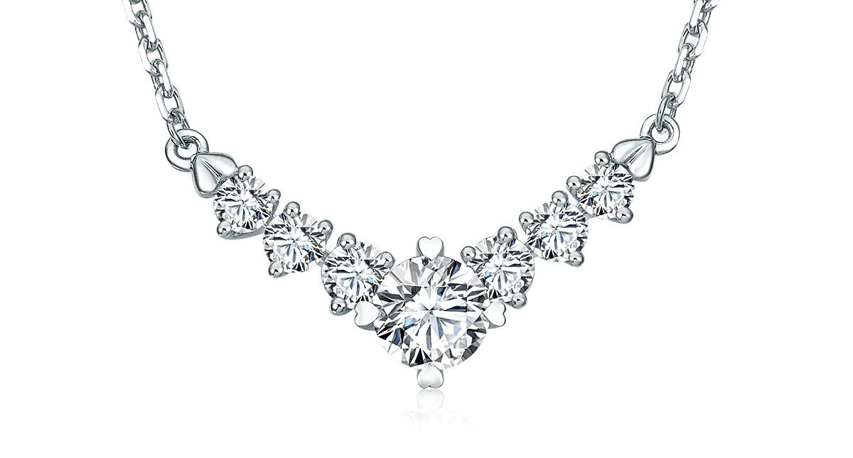A white gold necklace adorned with multiple sparkling diamonds, luxurious and refined.