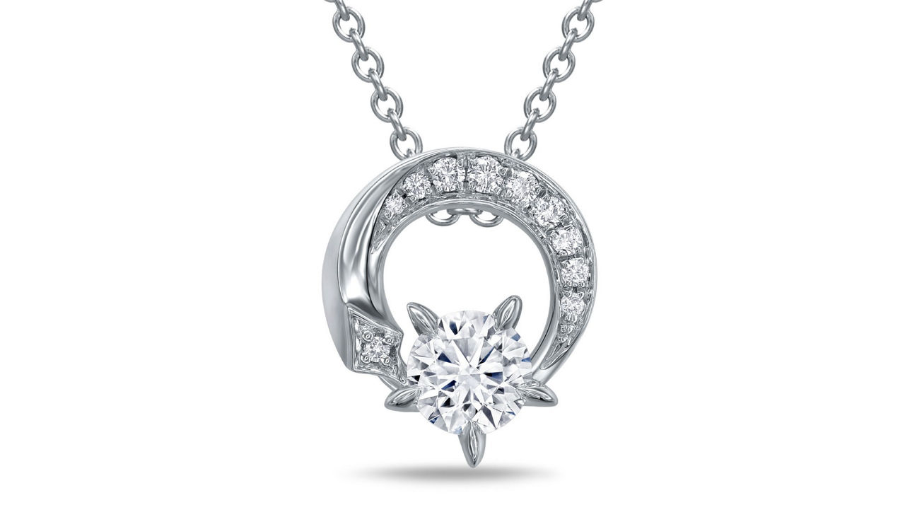 Sparkling platinum diamond pendant necklace with circular and star motifs, exuding a romantic glow.