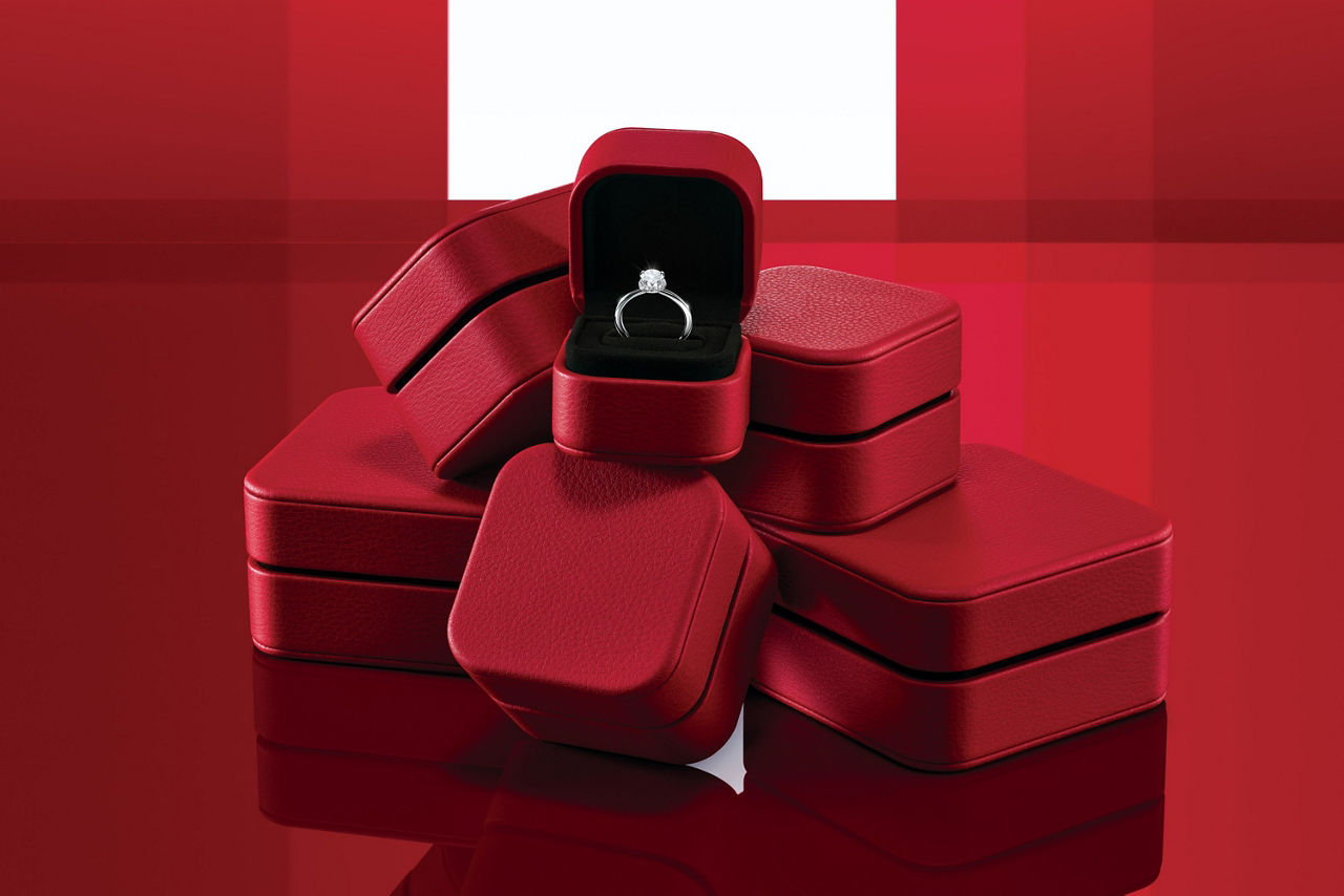 A delicate diamond ring placed at the centre represents the promise of love.