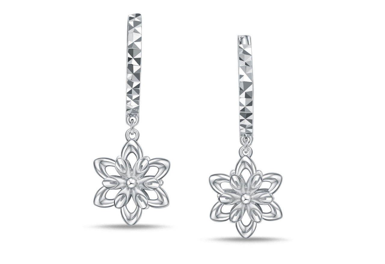 Delicately cut to showcase icy crystal lines, white gold snowflake earrings perfectly echo the romantic ambiance of winter.