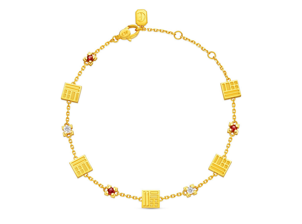 This gold bracelet featuring five "Fu(福)" characters, embedded with natural diamonds and rubies, represents blessings of joy and wealth.