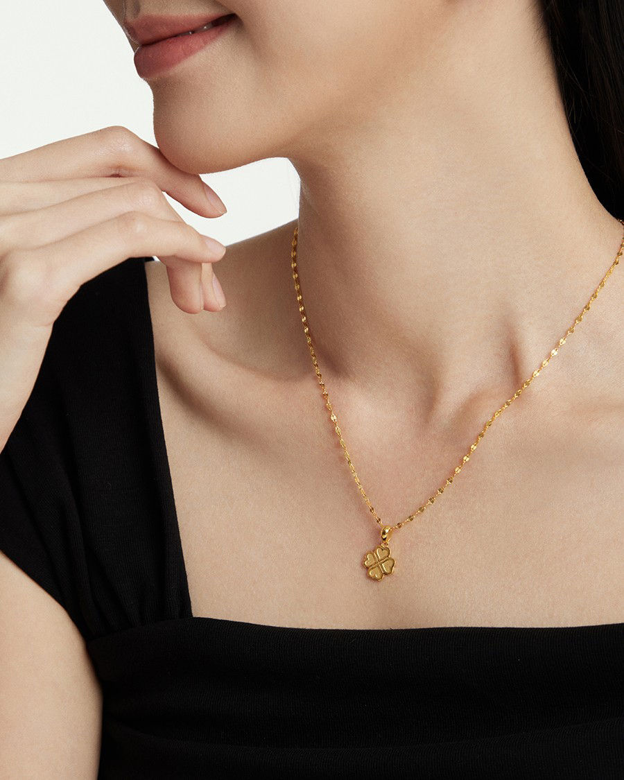 Adorn yourself with a lucky four-leaf clover gold necklac, bringing good vibes and adding a touch of stylish flair.