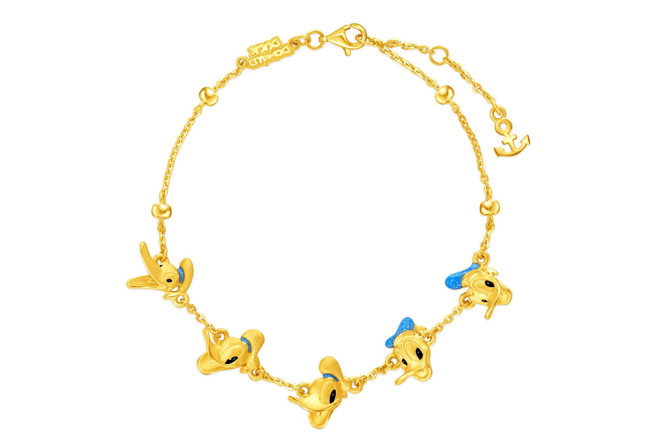 A gold chain with five Donald Duck pendants, featuring his blue hat and a delicate anchor clasp for a playful, vibrant look.