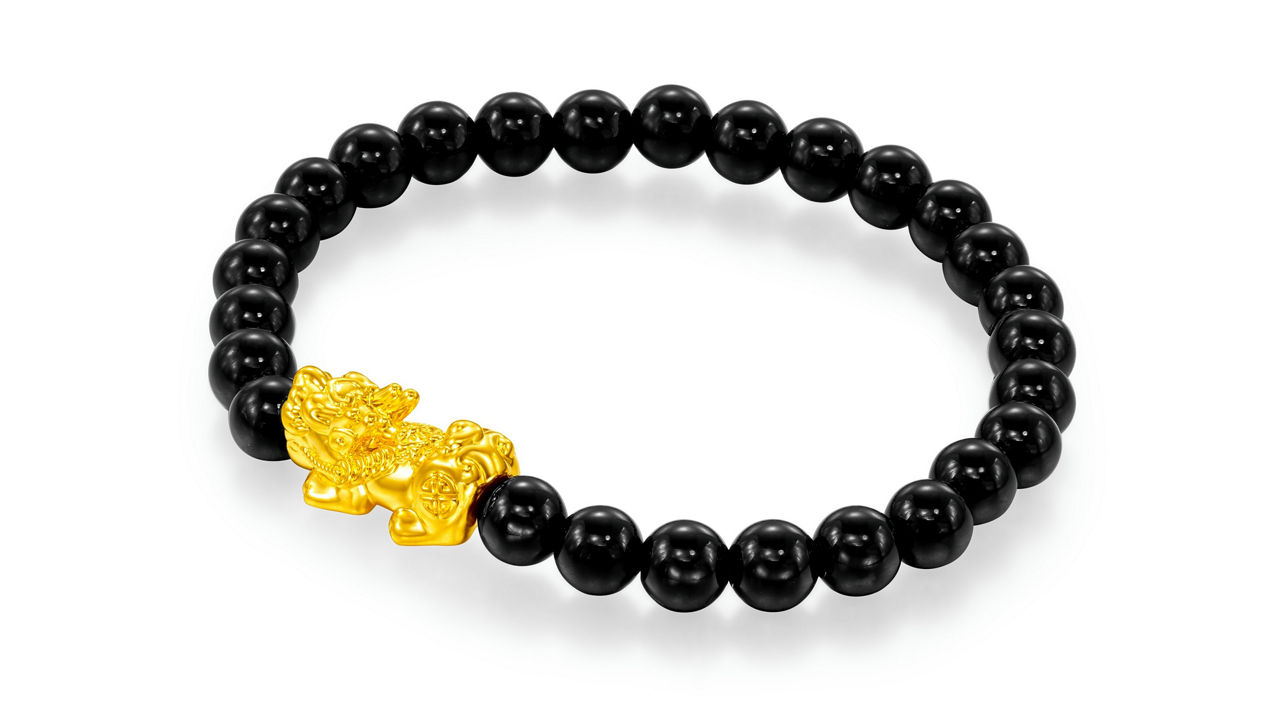 A 999 pure gold Pixiu bracelet symbolizes wealth attraction, blessings, and auspicious protection.