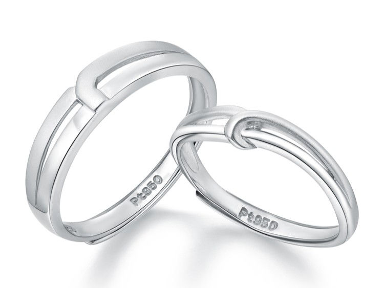Platinum wedding bands with Pt950 hallmarks, demonstrating the purity stamp required under Hong Kong regulations. 