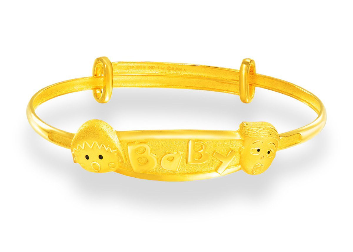A gold bracelet with cute cartoon designs and "Baby", symbolizing happiness and health.